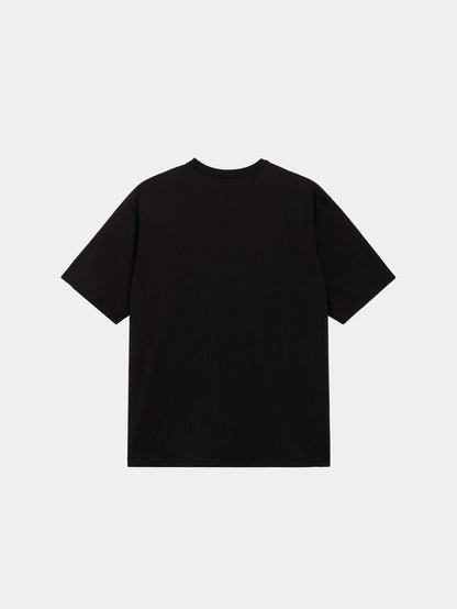 Black cotton tee with short sleeves, shown from the back; simple crewneck design. Alpha Caution Tape Tee by Alpha Industries.