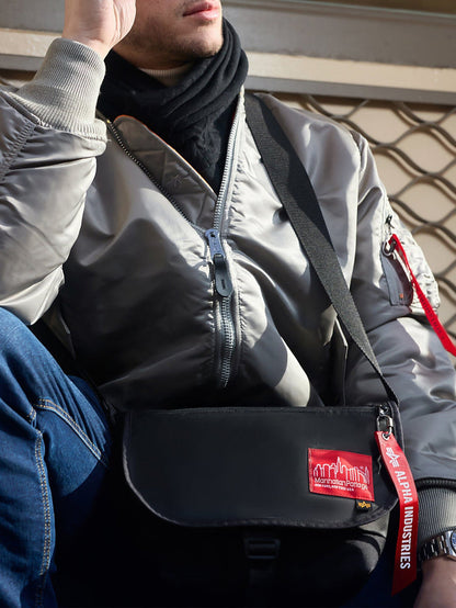 ALPHA X Manhattan Portage Nylon Messenger Bag SM by Alpha Industries, flight nylon fabric, silver color, rescue orange lining, red tag.