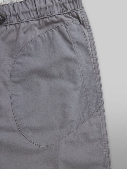 Alpha Industries Deck Shorts, gray fabric, visible stitching, breathable elastic waistband.