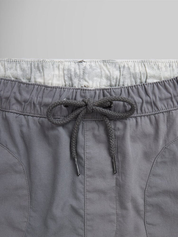 Alpha Industries Deck Shorts in gray with visible stitching and white lining.