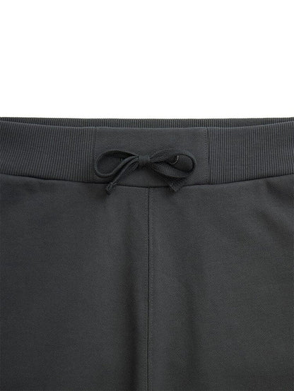 Essential French Terry Short by Alpha Industries, dark green ribbed waistband with center drawstring, French terry fabric.
