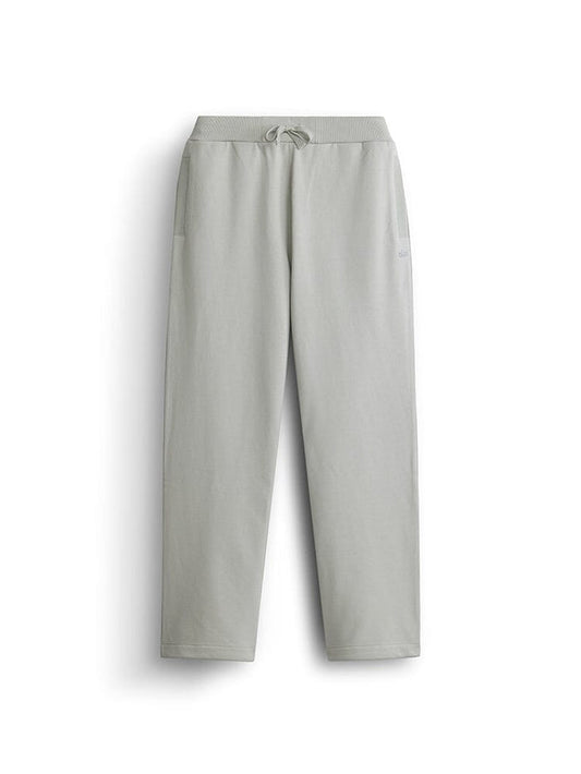 Alpha Industries Essential French Terry Sweatpant in Light Gray with elastic waistband, adjustable drawcord, and side pockets.
