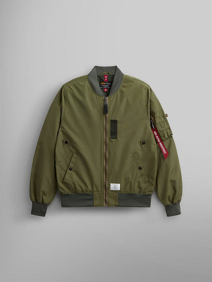 Alpha Industries L-2B Skymaster Gen II Bomber Jacket, OG-107 Green, lightweight nylon, front zipper, ribbed cuffs and hem, sleeve pocket with oxygen tab detail, red Remove Before Flight tag.