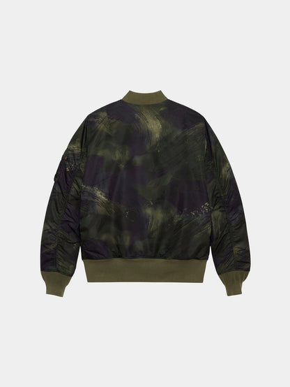 Alpha Industries MA-1 Mod Bomber Jacket with water-resistant olive and black camo, olive ribbed cuffs, hem, and collar.