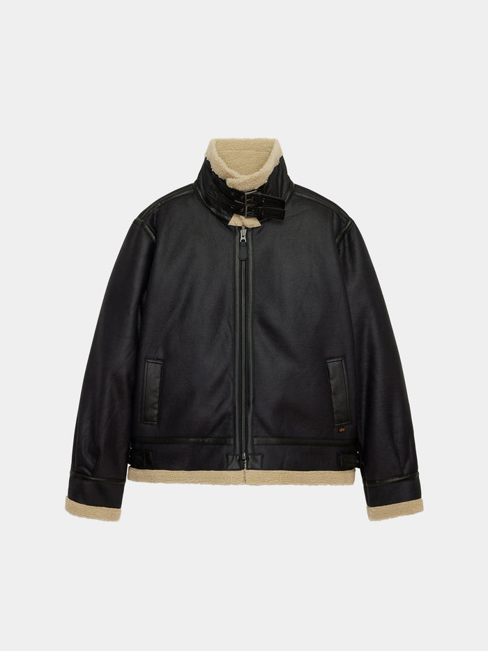 Mouton B-3 by Alpha Industries, black faux leather aviator jacket with shearling lining, front zipper, buckle collar, beige trim.