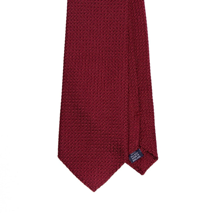 A Sovereign Grade Grenadine Grossa Ruby Tie showcasing quality on a white background by KirbyAllison.com.