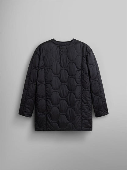 Back view of the Women's Mixed Media Quilted Long Liner by Alpha Industries, showcasing its black onion quilting pattern. The jacket boasts a circular, padded design with a sleek nylon liner.