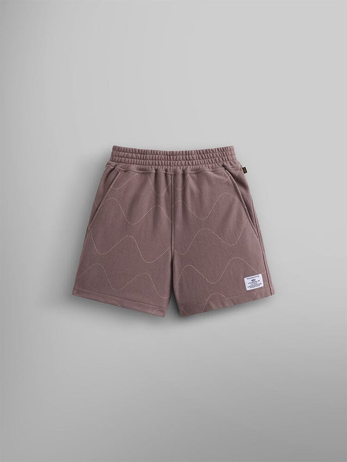 Alpha Industries Womens Quilted Shorts in Dusty Purple, wavy quilted pattern, elastic waistband, side pockets, white patch on lower left leg, terry fleece.