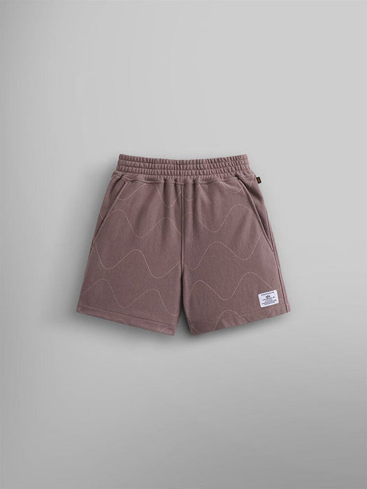 Alpha Industries Womens Quilted Shorts in Dusty Purple, wavy quilted pattern, elastic waistband, side pockets, white patch on lower left leg, terry fleece.